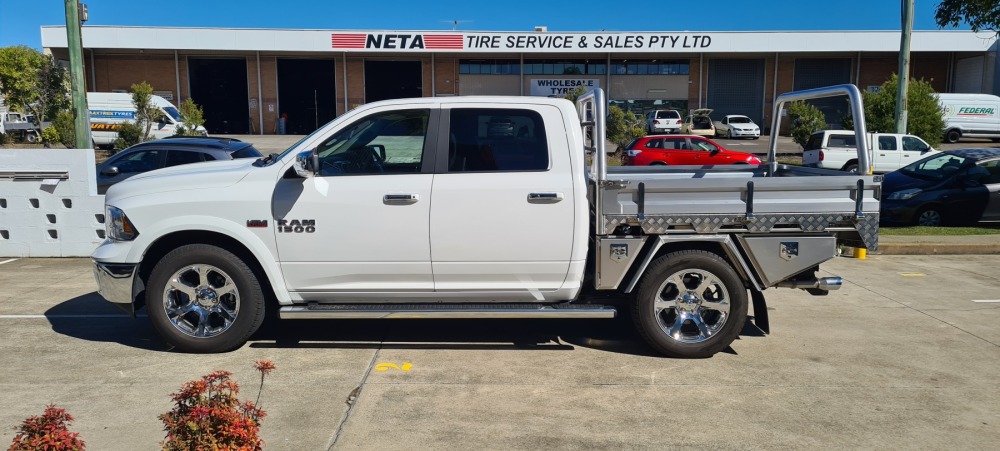 This is a image of a heavy duty ute tray called deluxe tray on a RAM 1500 side on shot