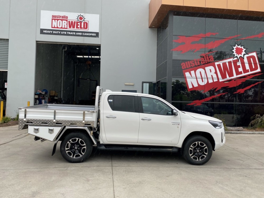 This is a photo of a Toyota Tacoma with a Heavy Duty Aluminium Flatbed