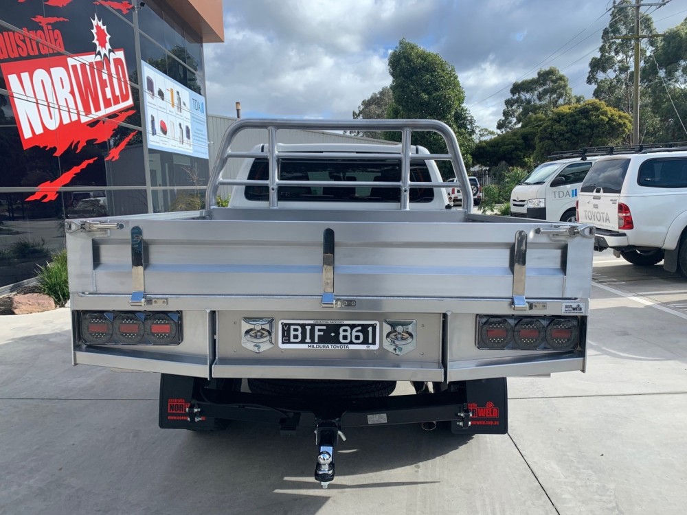 This is a photo of a Toyota Tacoma with a Heavy Duty Aluminium Flatbed