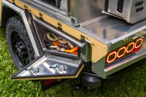 Ford Super Duty with tray toolbox open and canopy on top