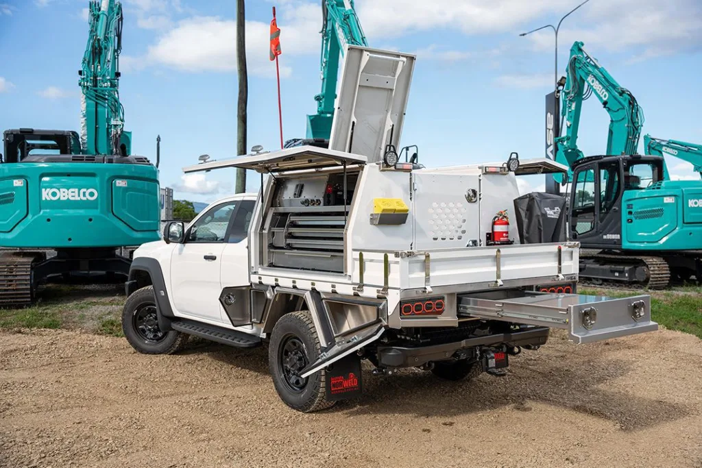 Ford Super Duty with twin gullwing toolboxes left corner rear