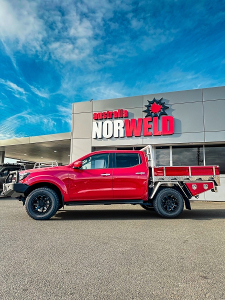 This is a photo of a Nissan Navara with a Heavy Duty Aluminium Ute Tray