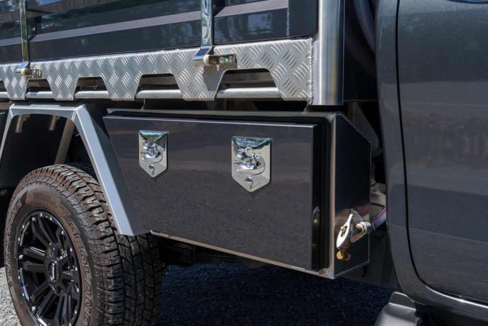 This is a image of a Heavy Duty Aluminium Ute Tray's  on a Toyota Hilux showcasing front toolboxes